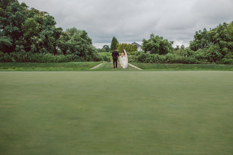 Brianna and Joe perfectly balances each other with their opposite personalities. Brianna quiet and calm and Joe loud and funny, they are the yin and yang to each other and together they create amazing chemistry. Joe's eyes literally sparkles when he is looking at her. Brianna and Joe's summer wedding at Trump National Golf Club Colts Neck NJ this past August was nothing but fun, filled with love and happy tears. Love is all we need in a wedding day! Brianna and Joe got married at ST. Mary’s Church in Colts Neck NJ then partied at Trump National Golf Club Colts Neck NJ. As soon as everyone was inside for the reception, the heavy grey clouds released a down pour washing the humidity away. Leaving cool evening for the newlyweds and their wedding guests to enjoy. Brianna and Joe's wedding at Trump National Golf Club Colts Neck NJ photographed by Karis, NY NJ wedding and elopement photographer Hey Karis.